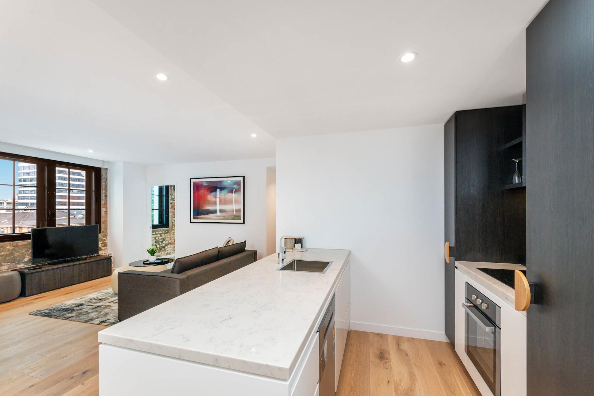 Fv By Peppers Aparthotel Brisbane Exterior photo The kitchen and living area of a typical apartment